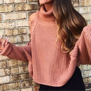 salmon brown turtleneck sweater cross tie sleeve
